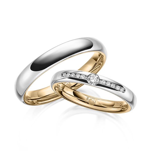 Paar Trauringe / Eheringe / innen Roségold 750 / außen Platin 950 / 0,14 ct.