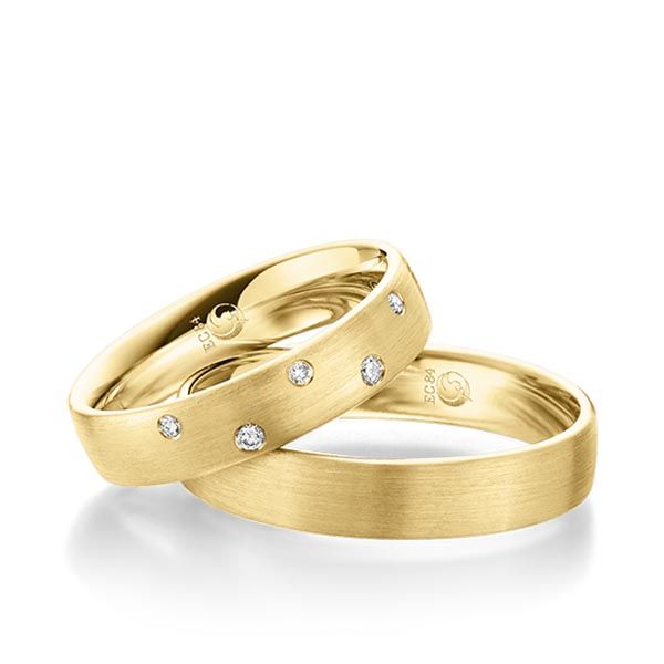 Paar Trauringe / Eheringe / Gelbgold 585 / 0,07 ct.