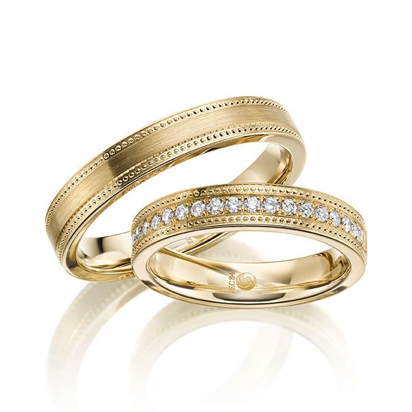 Paar Trauringe / Eheringe / Gelbgold 585 / 0,285 ct.