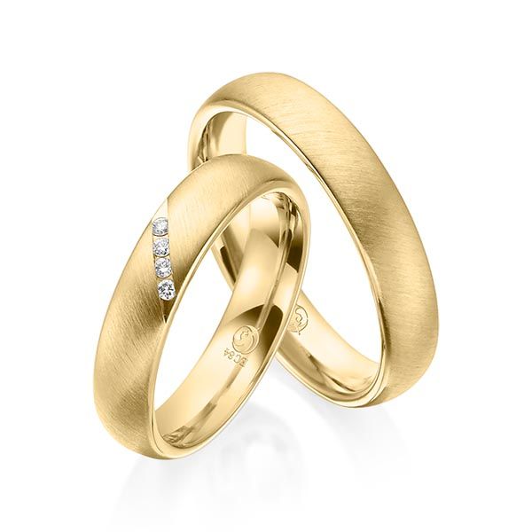 Paar Trauringe / Eheringe / Gelbgold 585 / 0,04 ct.