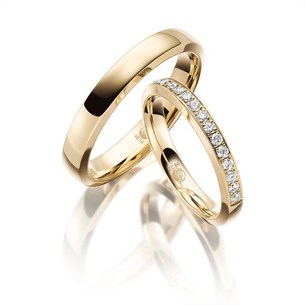 Paar Trauringe / Eheringe / Gelbgold 585 / 0,34 ct.