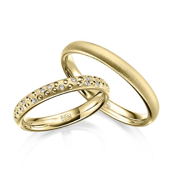 Paar Trauringe / Eheringe / Gelbgold 585 / 0,06 ct.
