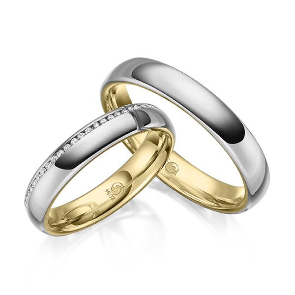 Paar Trauringe / Eheringe / innen Gelbgold 585 / außen Platin 600 / 0,145 ct.
