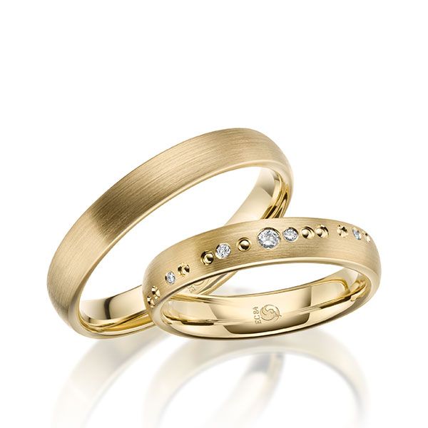 Paar Trauringe / Eheringe / Gelbgold 585 / 0,051 ct.