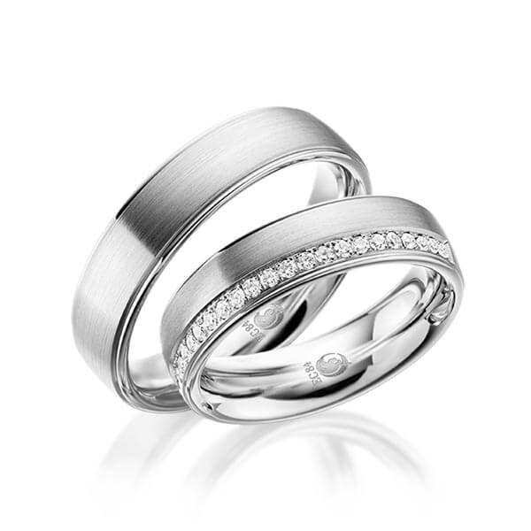 Paar Trauringe / Eheringe / Weißgold 585 / 0,23 ct.