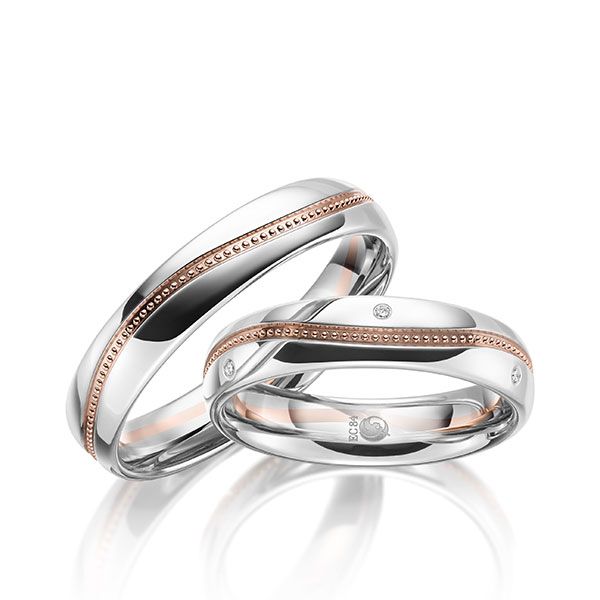 Paar Trauringe / Eheringe / Platin 950 / Rotgold 750 / 0,03 ct.