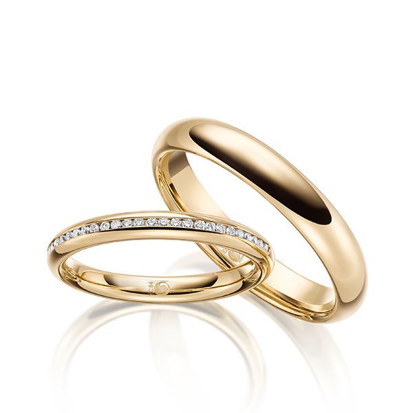 Paar Trauringe / Eheringe / Gelbgold 585 / 0,145 ct.