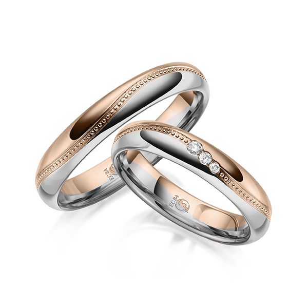 Paar Trauringe / Eheringe / Rotgold 585 / Platin 600 / 0,060 ct.