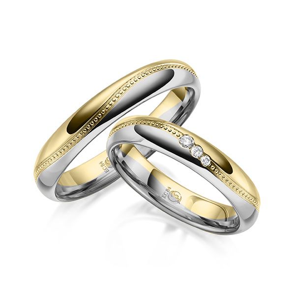 Paar Trauringe / Eheringe / Gelb- und Weißgold 585 / 0,060 ct.