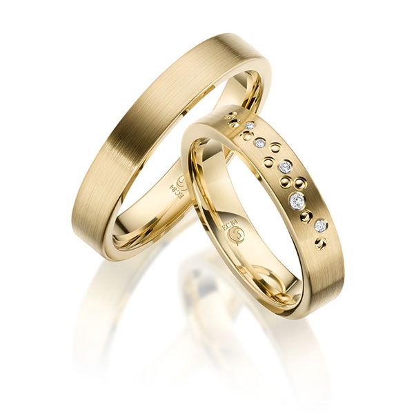 Paar Trauringe / Eheringe / Gelbgold 585 / 0,06 ct.