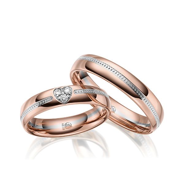 Paar Trauringe / Eheringe / Rotgold 585 / Weißgold 585 / 0,075 ct.