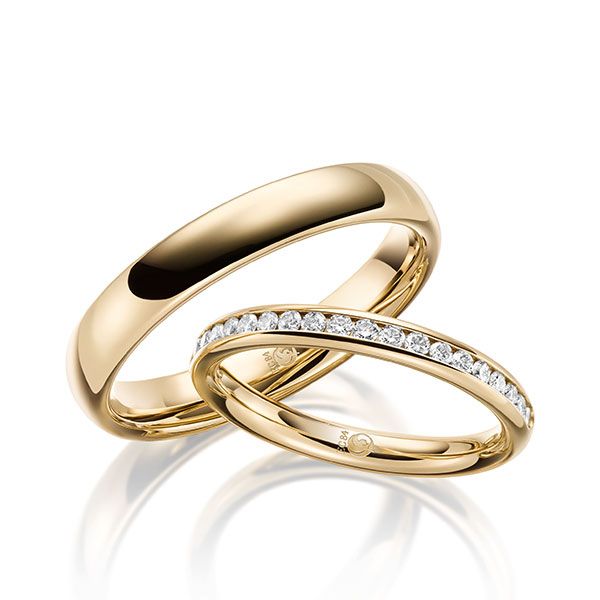 Paar Trauringe / Eheringe / Gelbgold 585 / 0,30 ct.