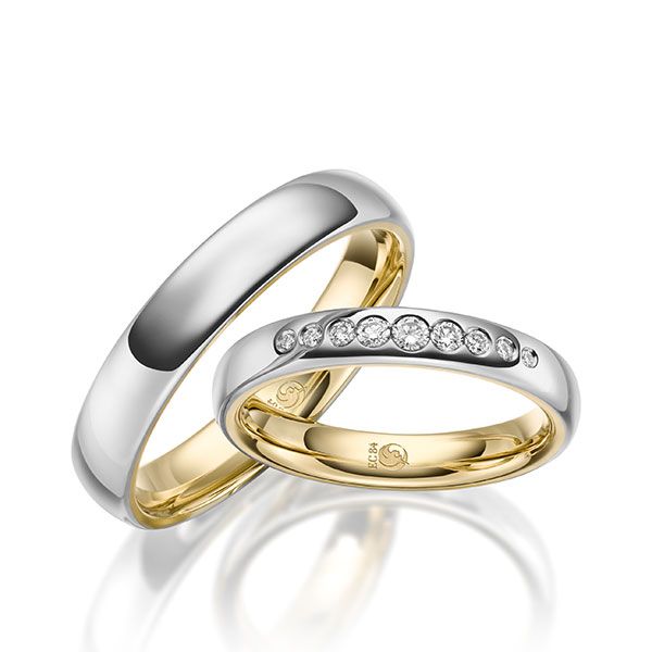 Paar Trauringe / Eheringe / innen Gelbgold 585 / außen Weißgold 585 / 0,142 ct.