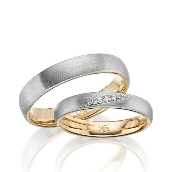 Paar Trauringe / Eheringe / innen Gelbgold 585 / außen Palladium 950 / 0,036 ct.
