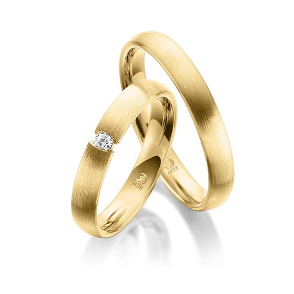 Paar Trauringe / Eheringe / Gelbgold 585 / 0,07 ct.